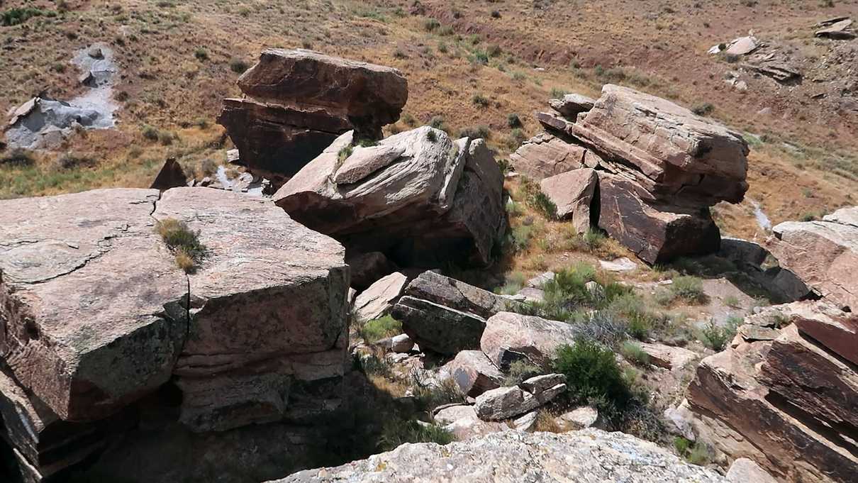 Large rock grouping in grassy field