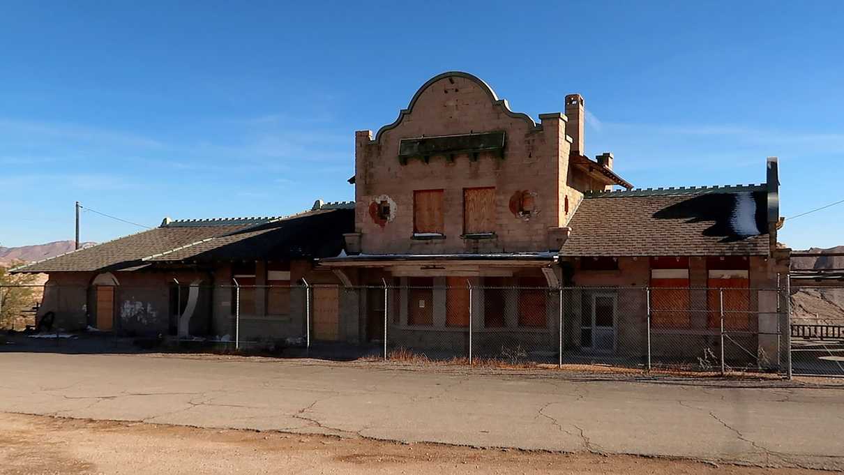 Fenced off and boarded up train station