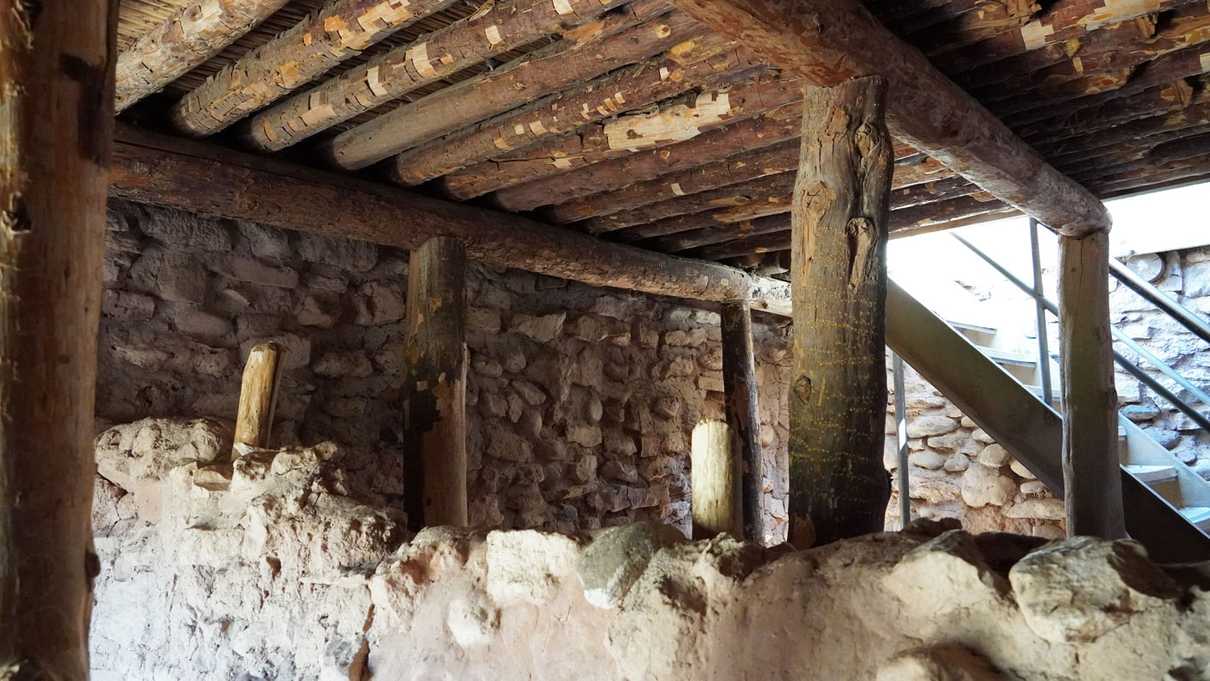 Interior of reconstructed room with wooden beams