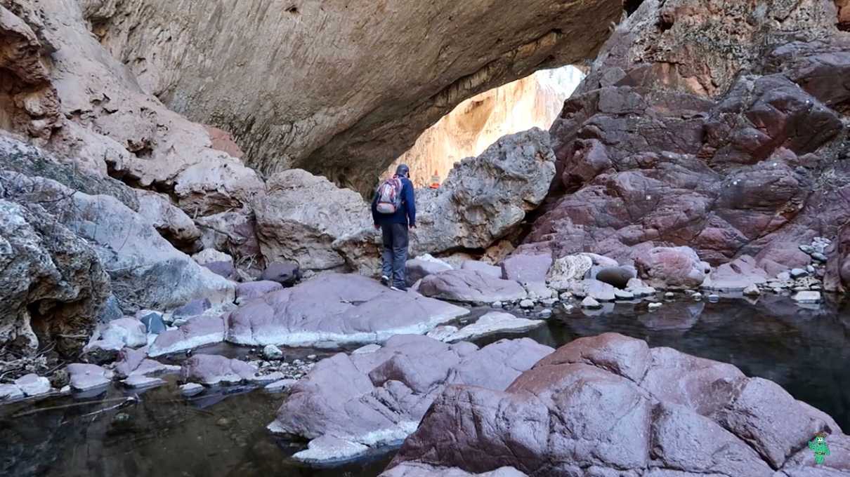 Me navigating the slick rocks leading to the underside of Tonto Natural Bridge