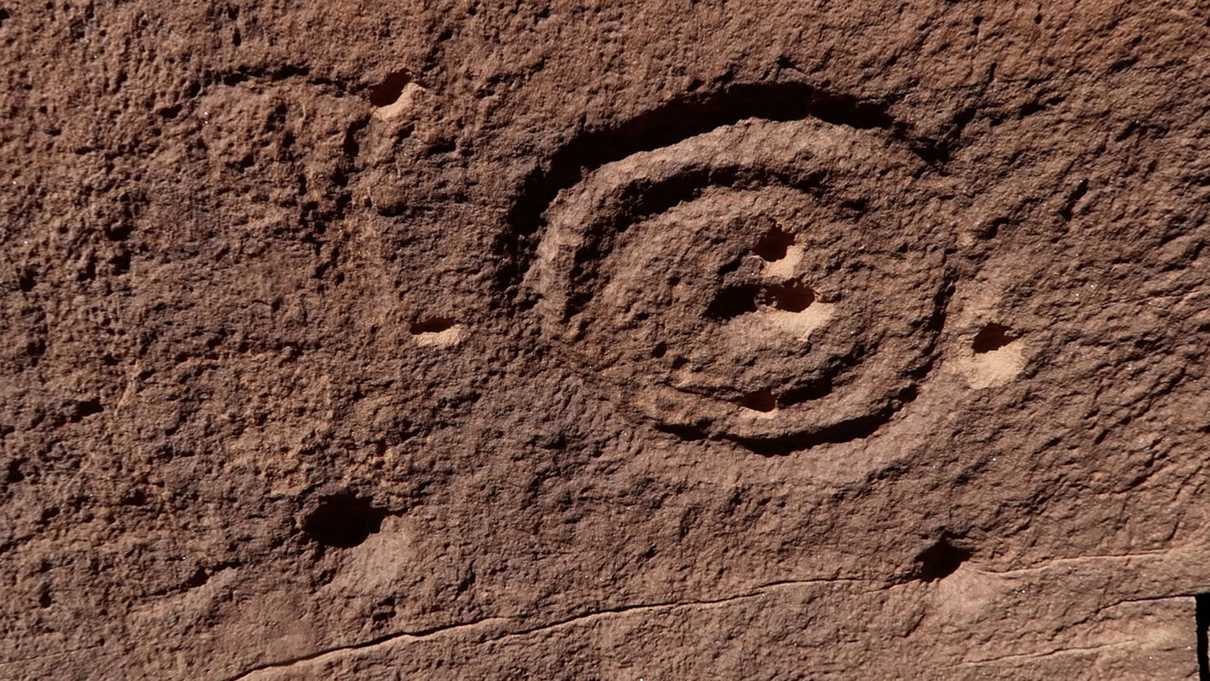 Spiral shaped petroglpyh in a boulder