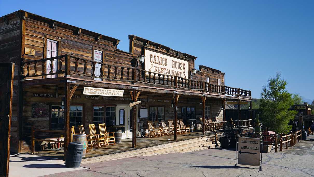 Wooden western style building with Calico House Restaurant sign