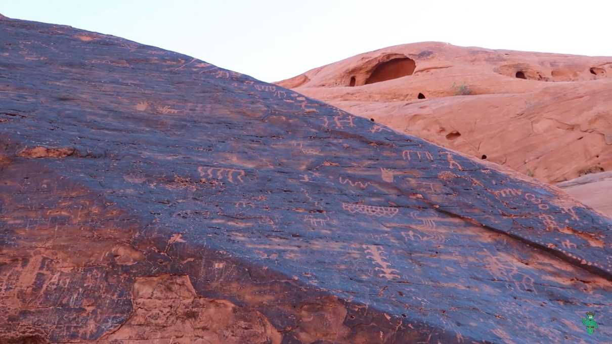 Many petroglyphs on desert varnish near the beginning to Mouse's Tank trail