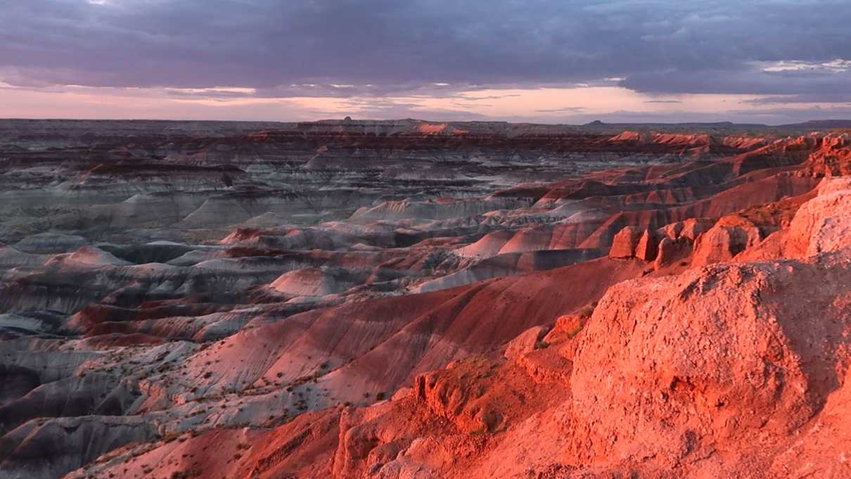 Striped hills aglow with setting sun