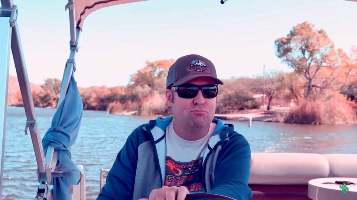 Me piloting a pontoon boat for the firs time at Patagonia Lake State Park