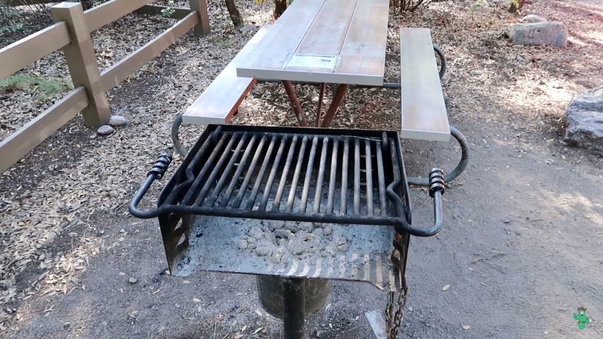 A grill and picnic table at Bonita Canyon Campground