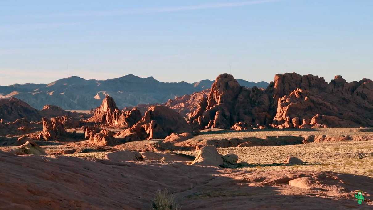 Jagged red sandstone formations at sunset off of White Domes Road.