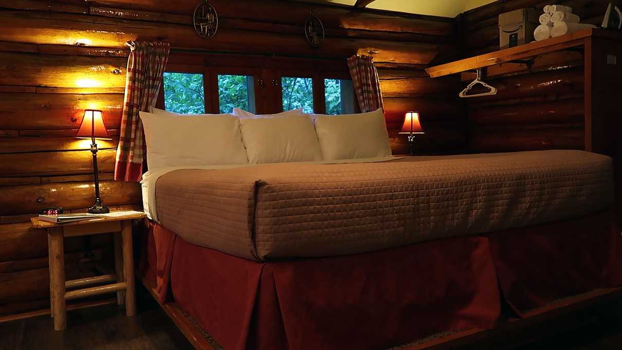The large bed in cabin 16 at the Butterfly Garden Inn