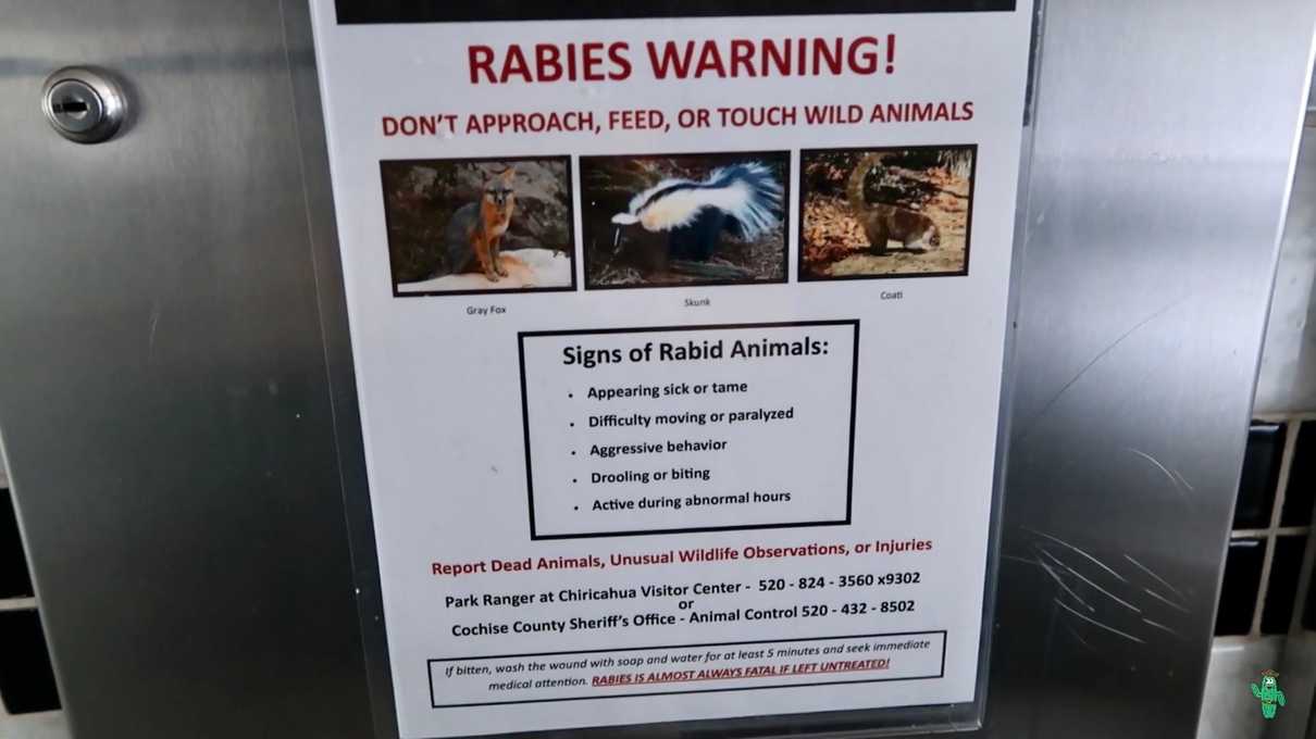 A rabies warning sign posted in the restroom of Chiricahua