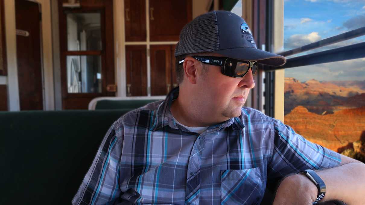 Passenger looking out train window