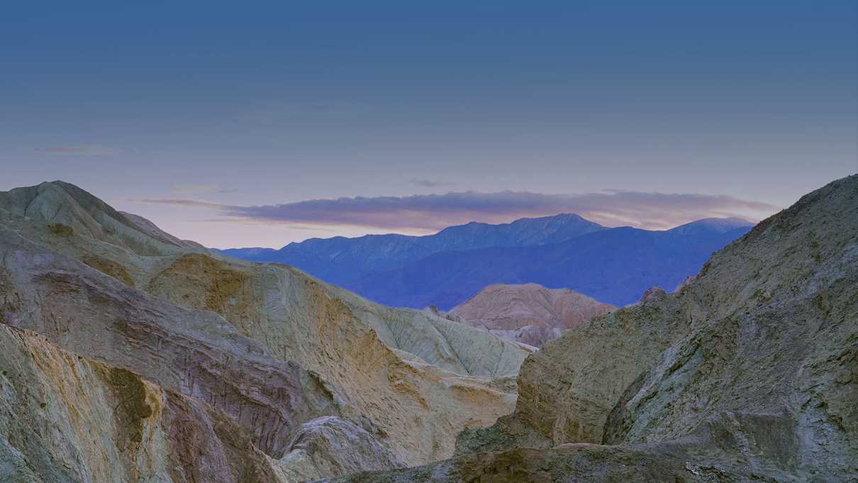 Golden yellow walls and Death Valley in the distance